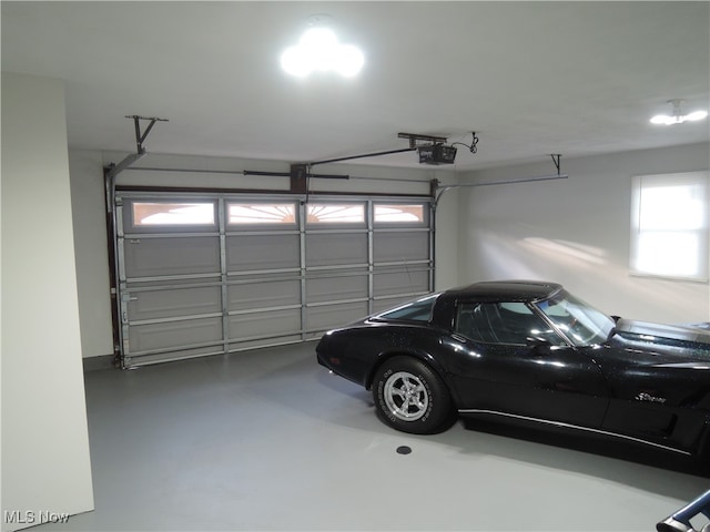 garage featuring a garage door opener