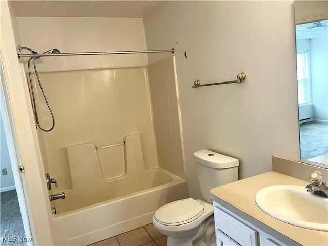 full bathroom with toilet, tub / shower combination, a textured ceiling, and tile patterned floors