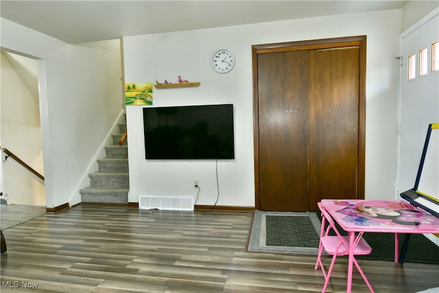 living room with hardwood / wood-style flooring