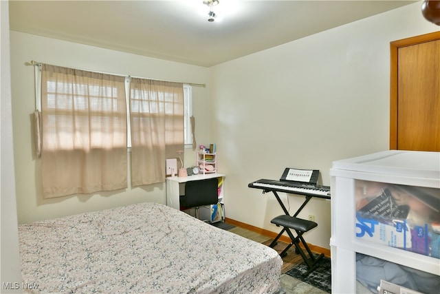 bedroom featuring hardwood / wood-style floors