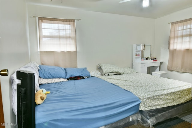 bedroom featuring ceiling fan