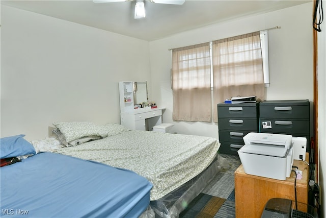 bedroom featuring ceiling fan