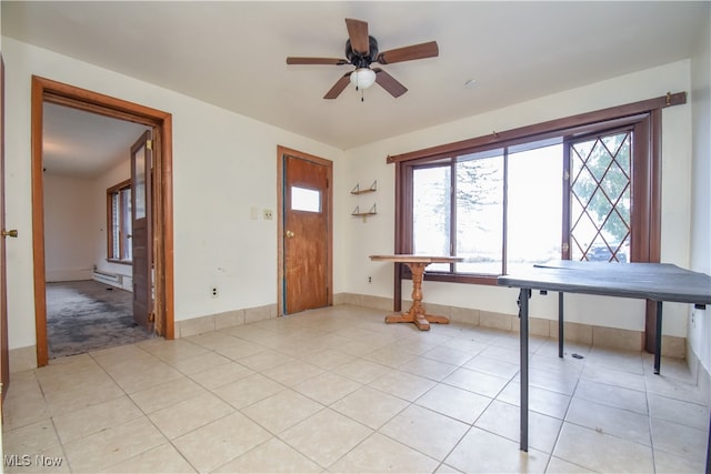 tiled foyer with ceiling fan