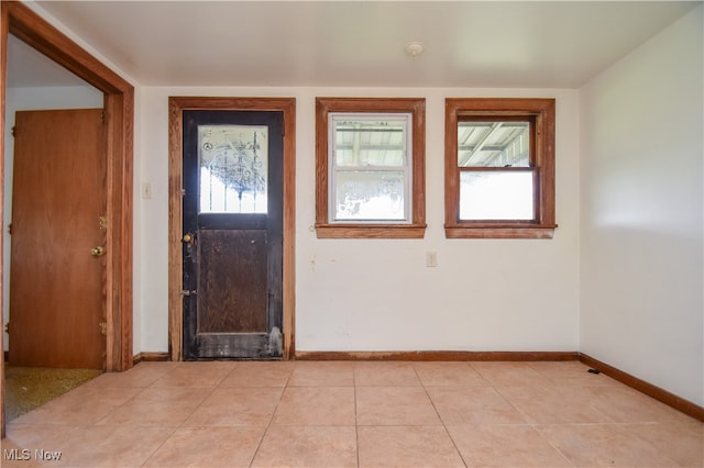 foyer with light tile patterned floors