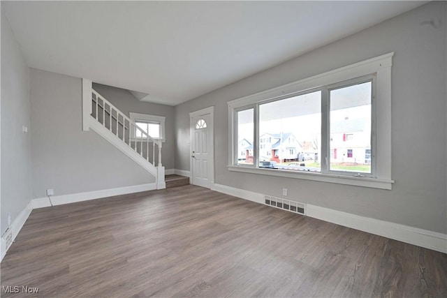 entrance foyer with hardwood / wood-style flooring