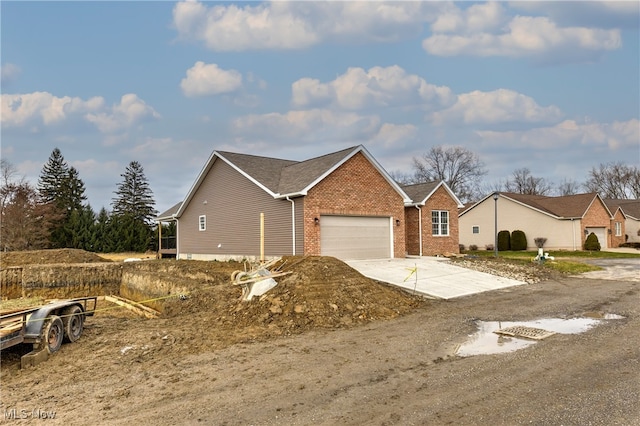 single story home with a garage