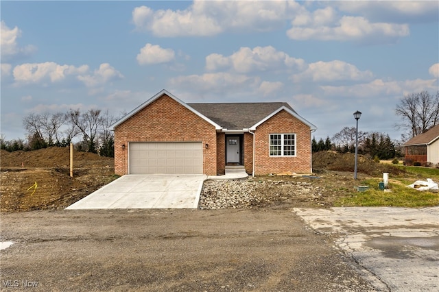 153 Royal Troon, Warren, OH 44484 - view of front facade featuring a garage
