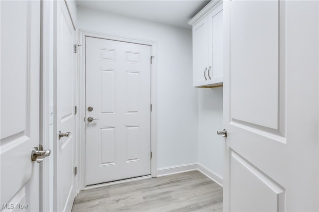 doorway featuring light hardwood / wood-style floors