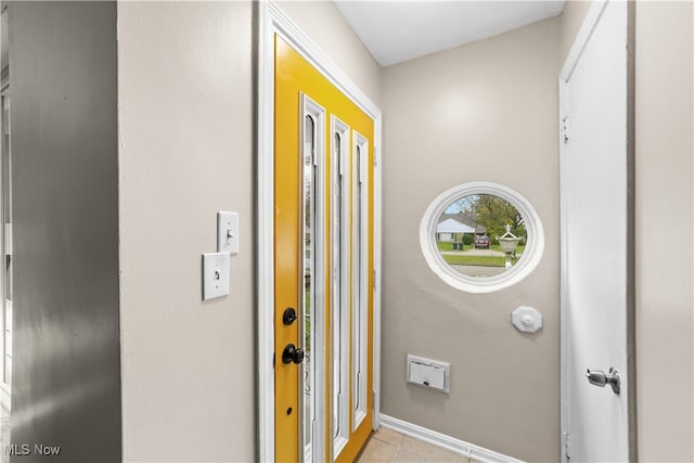 interior space featuring light tile patterned floors