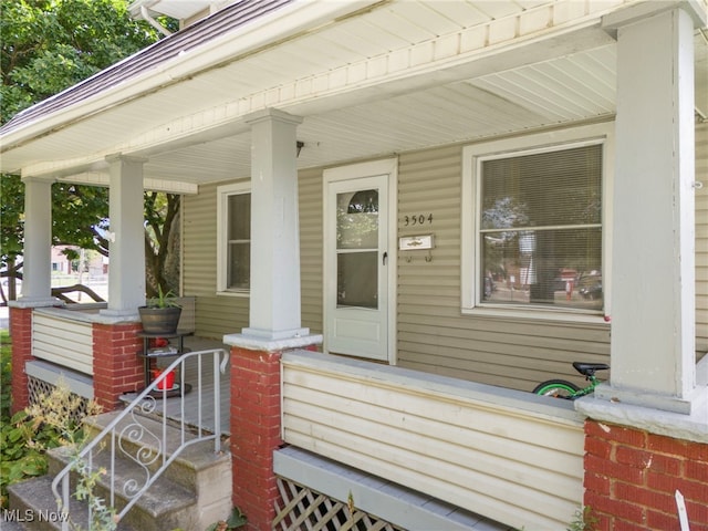 entrance to property with a porch