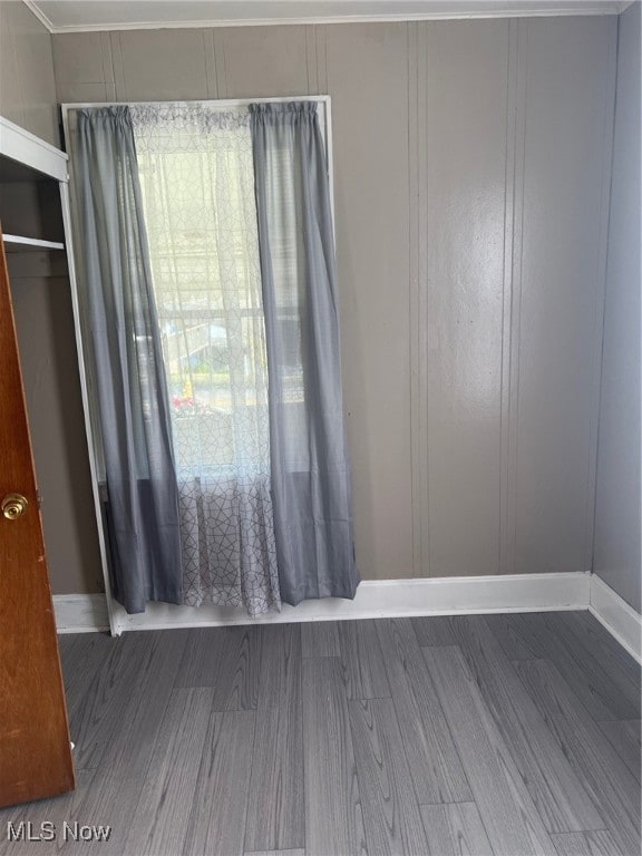 spare room featuring hardwood / wood-style floors