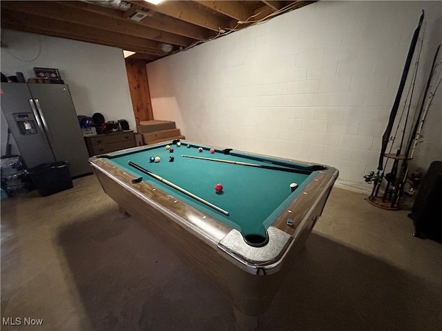 playroom with concrete flooring and billiards