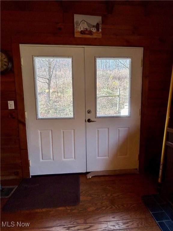 2886 Ossia Rd, Duck, WV 25063 - foyer featuring wood finished floors, wooden walls, and french doors