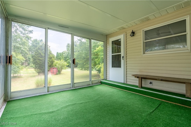 unfurnished sunroom with plenty of natural light