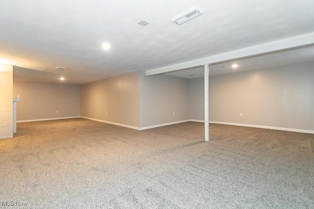 basement featuring carpet floors