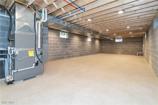 basement featuring heating unit