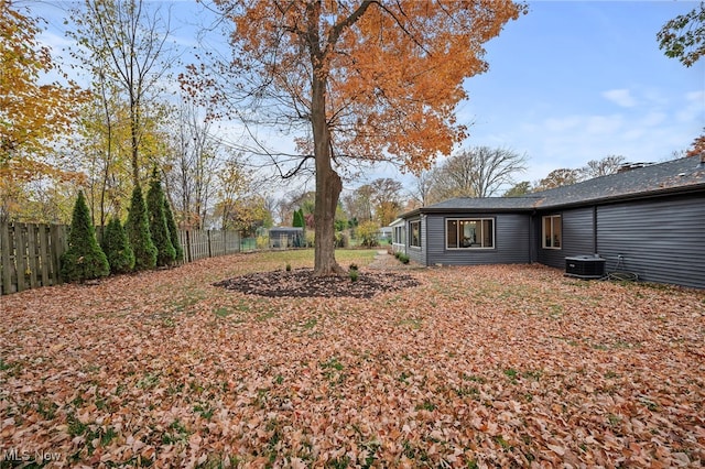 view of yard with central AC unit