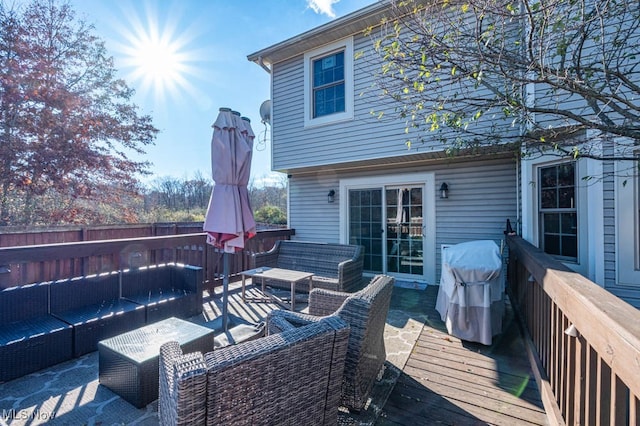 deck with outdoor lounge area