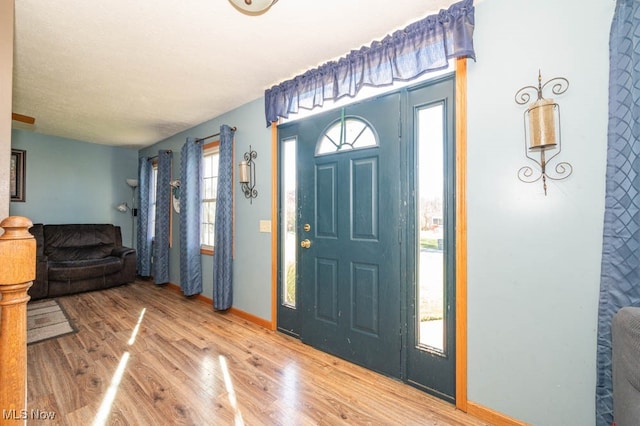 foyer featuring hardwood / wood-style flooring