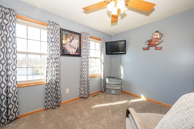 bedroom featuring carpet and ceiling fan