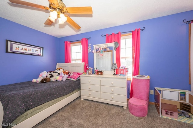 bedroom featuring carpet and ceiling fan