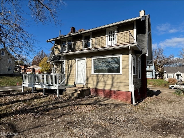 view of front facade with a deck