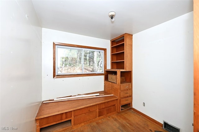 interior space with hardwood / wood-style flooring