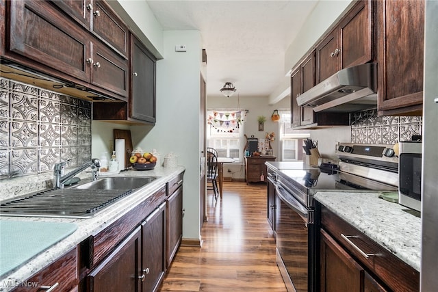 kitchen featuring sink, ventilation hood, dark brown cabinets, stainless steel electric range oven, and dark wood-type flooring