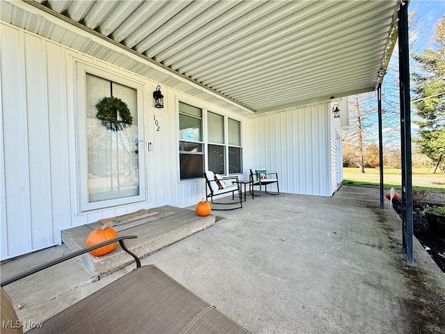 view of patio featuring a porch