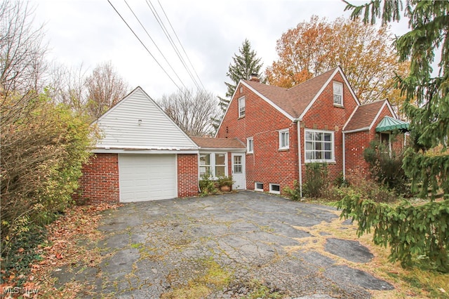 view of property exterior with a garage