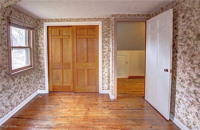 unfurnished bedroom featuring light hardwood / wood-style floors