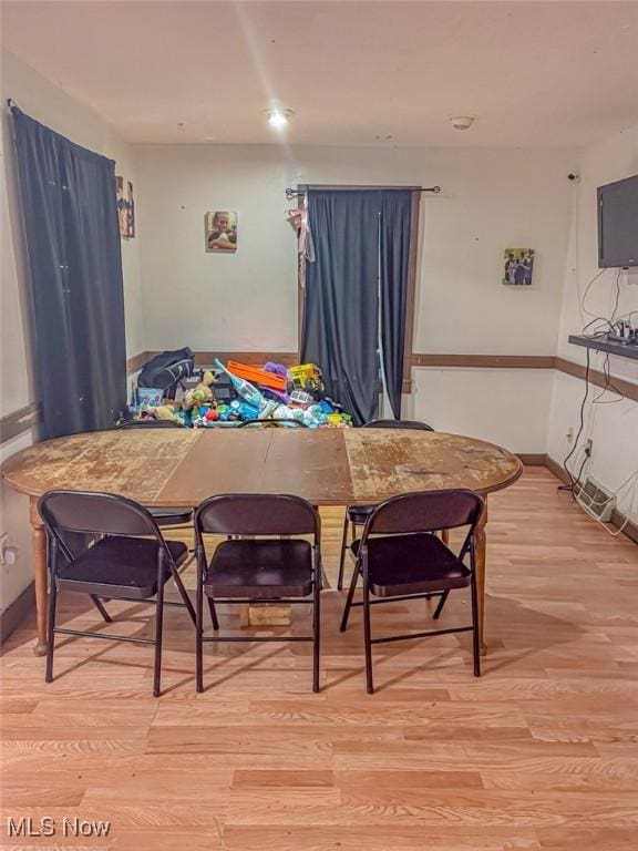 1330 W 18th St, Lorain, OH 44052 - dining area with light wood-type flooring and baseboards
