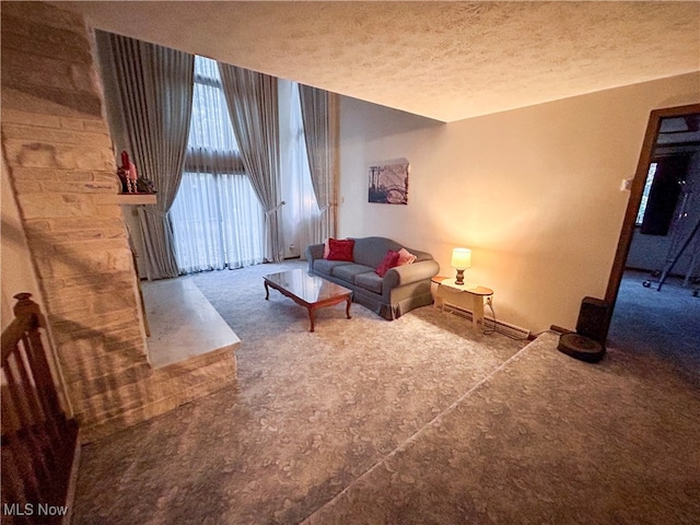 carpeted living room with a textured ceiling