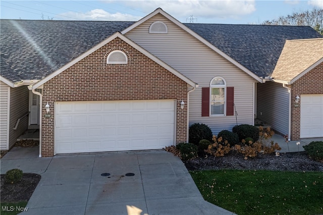 ranch-style home with a garage