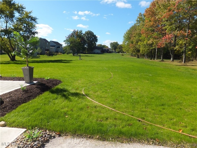 7596 W 130th St, Middleburg Heights, OH 44130 - view of community featuring a lawn