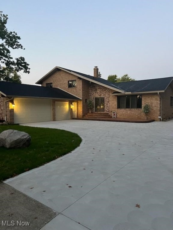 7596 W 130th St, Middleburg Heights, OH 44130 - view of front of home featuring a garage