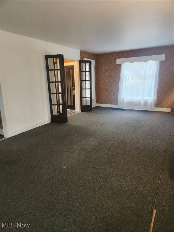 unfurnished room with carpet