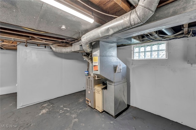 basement featuring heating unit