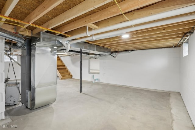 basement featuring heating unit