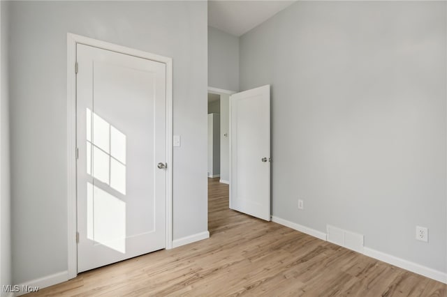 unfurnished bedroom featuring light hardwood / wood-style floors