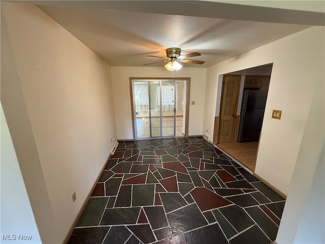 empty room featuring ceiling fan