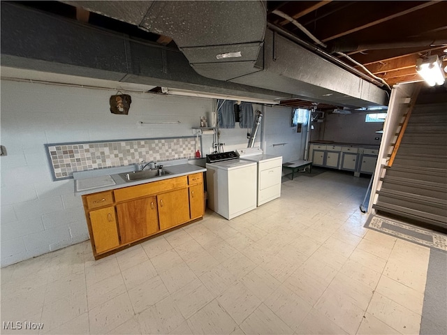 interior space with sink and separate washer and dryer