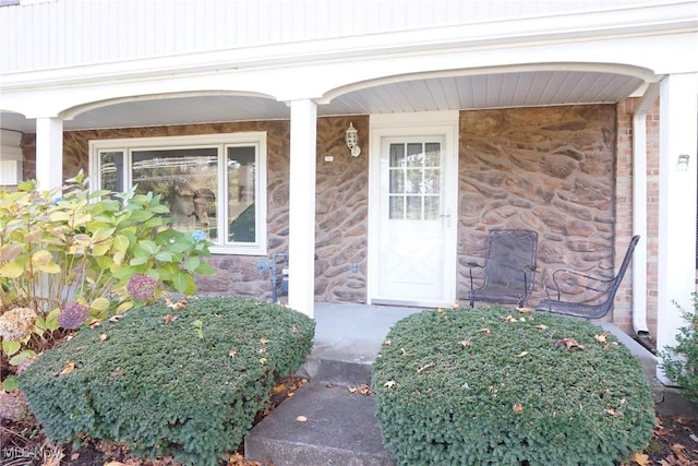 property entrance with a porch