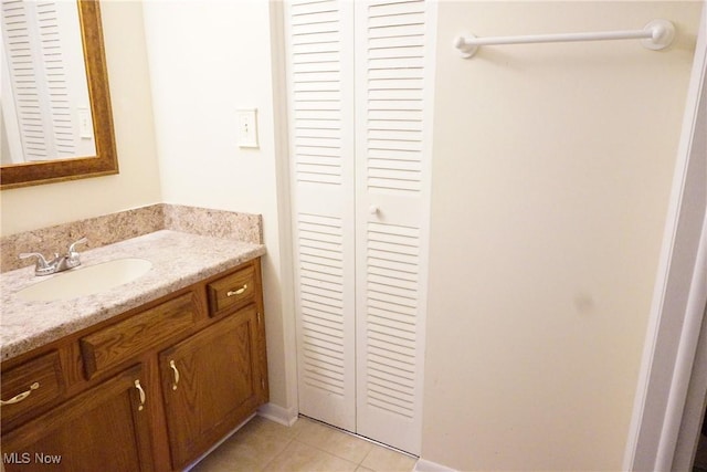 bathroom featuring vanity and tile patterned floors