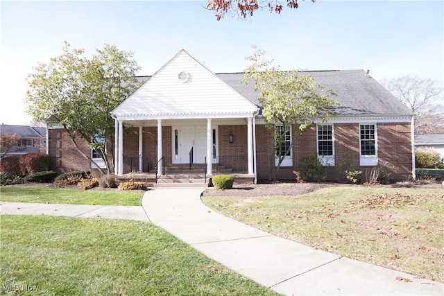 bungalow-style home featuring a porch and a front yard