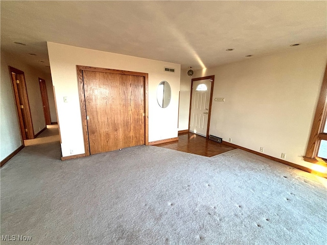 view of carpeted foyer