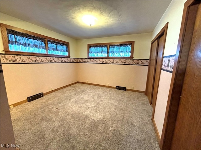 view of carpeted spare room