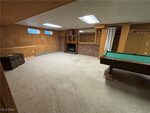 game room with wood walls, a baseboard radiator, billiards, and carpet