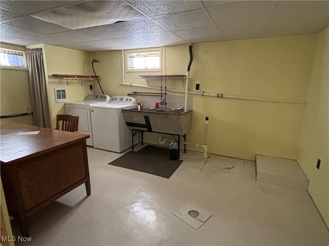 washroom featuring washer and clothes dryer