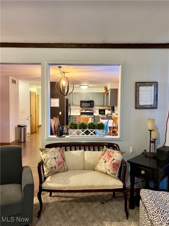 living room featuring crown molding